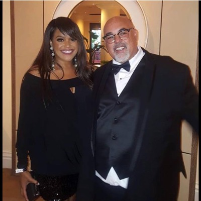 Tamla Claudette Robinson and her brother, Berry Robison, share a frame together.